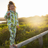 Girl Standing On Fence Wearing Dinosaur Koala Kids' Leggings