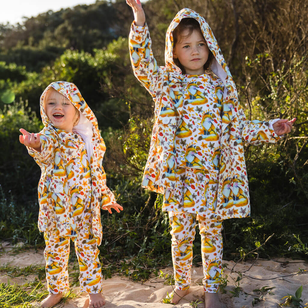 Little Girl Wearing Maple Fox Kids' Leggings With Other Maple Fox Products