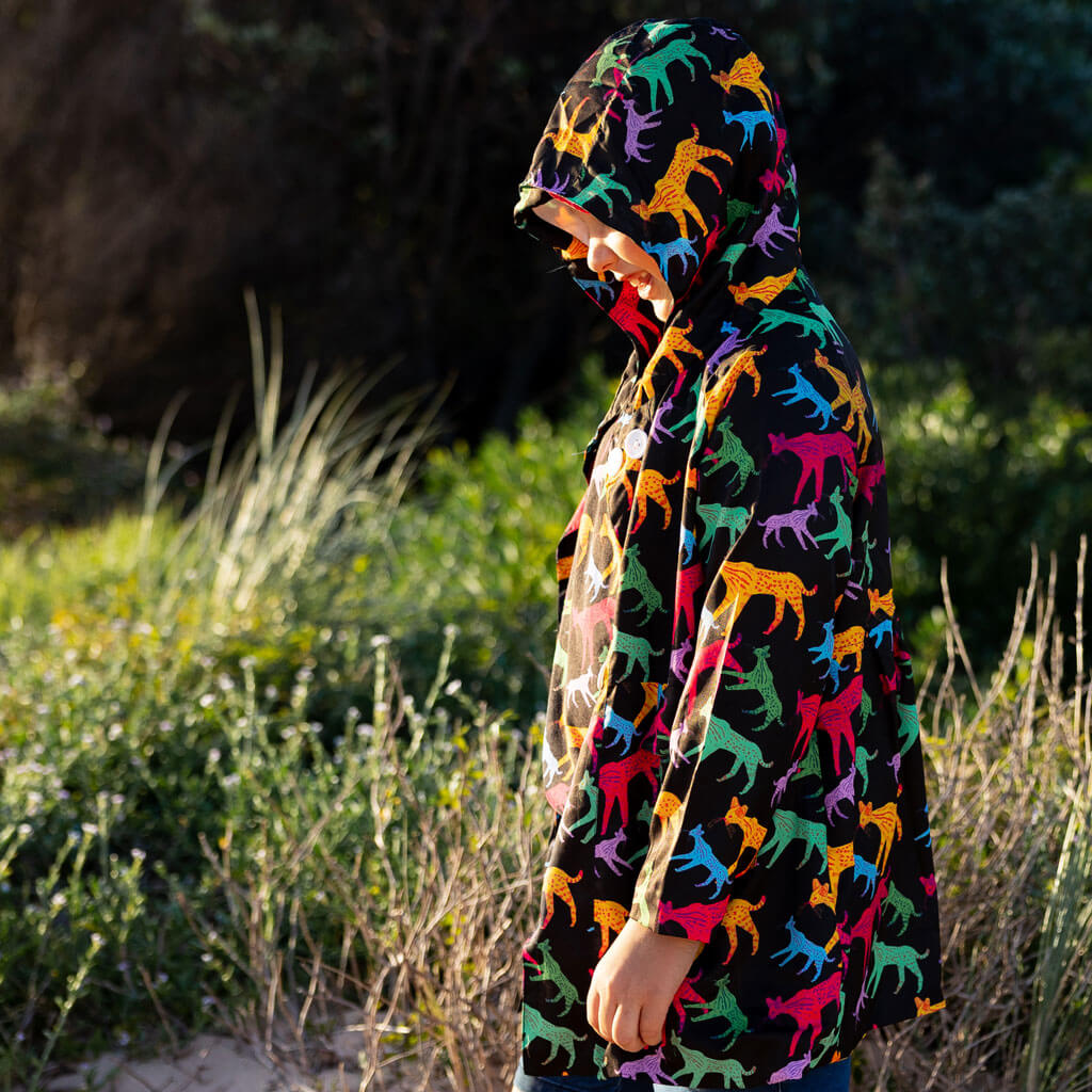 Boy Wearing Wills' Wildcats Raincoat