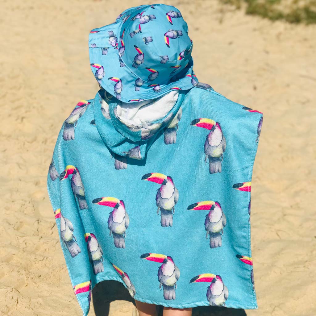 Child on Beach Wearing Toucan Beach Hat