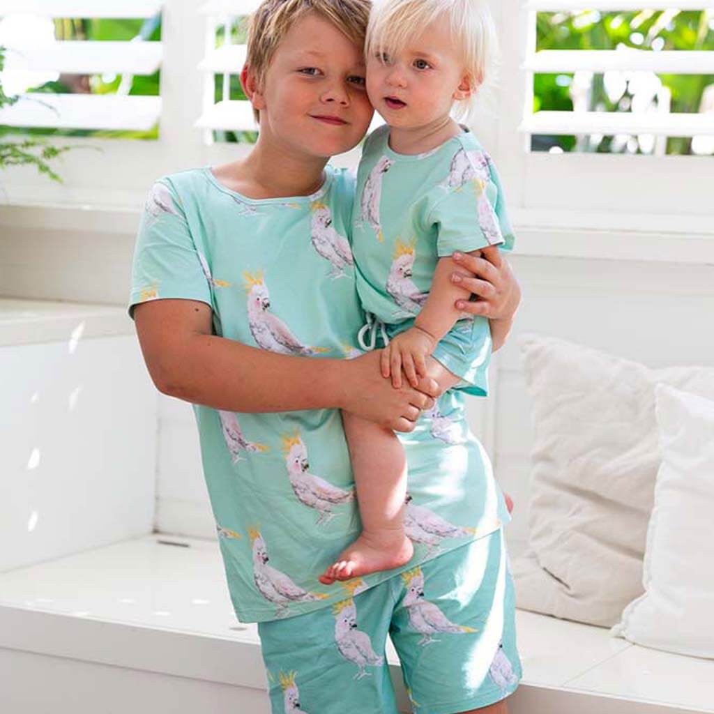 Two Boys Both Wearing Green Cockatoo Short Sleeve Tee