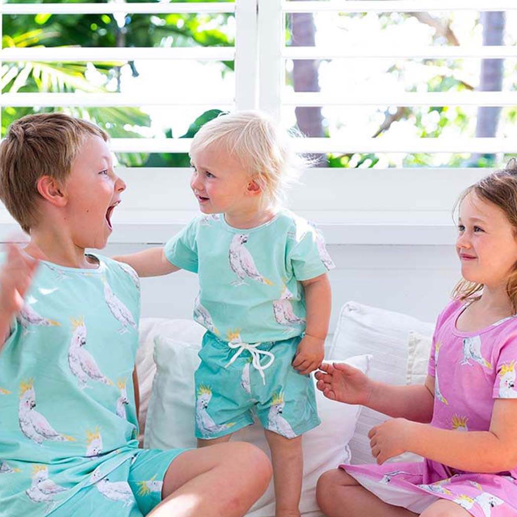 Two Boys Being Funny Wearing Green Cockatoo Short Sleeve Tee