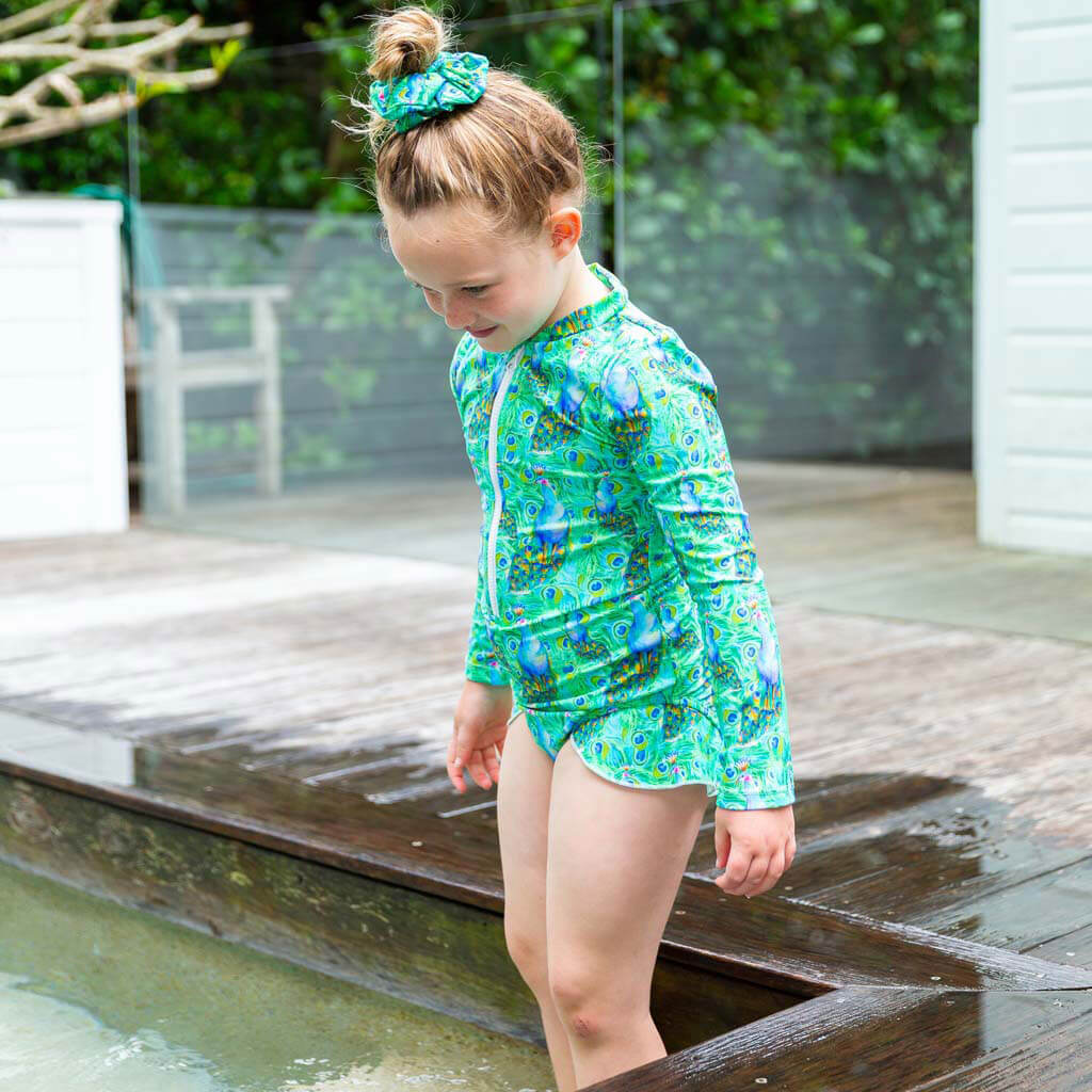 Girl Near Poolside Wearing Green Peacocks Girls Long Sleeve Zip Swimmers