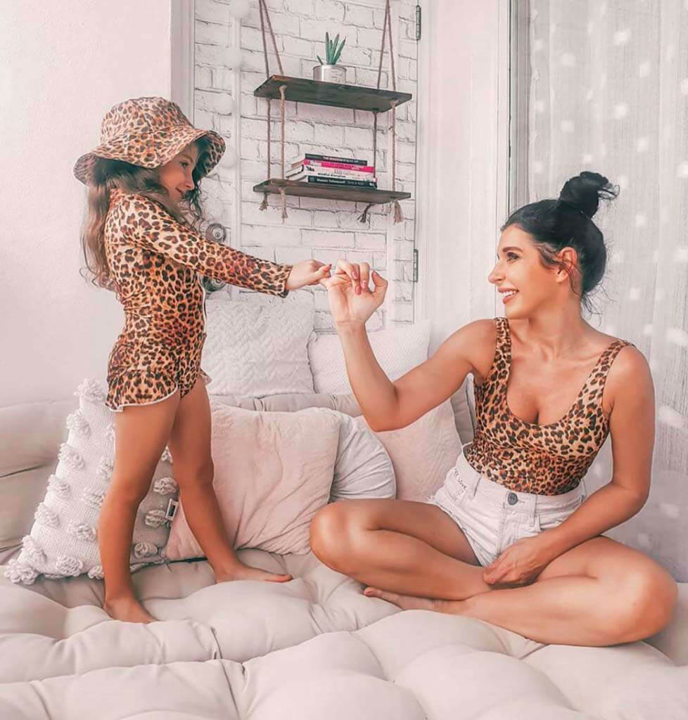 Girl Standing Wearing Leopard Print Long Sleeve Girls Zip Swimmers