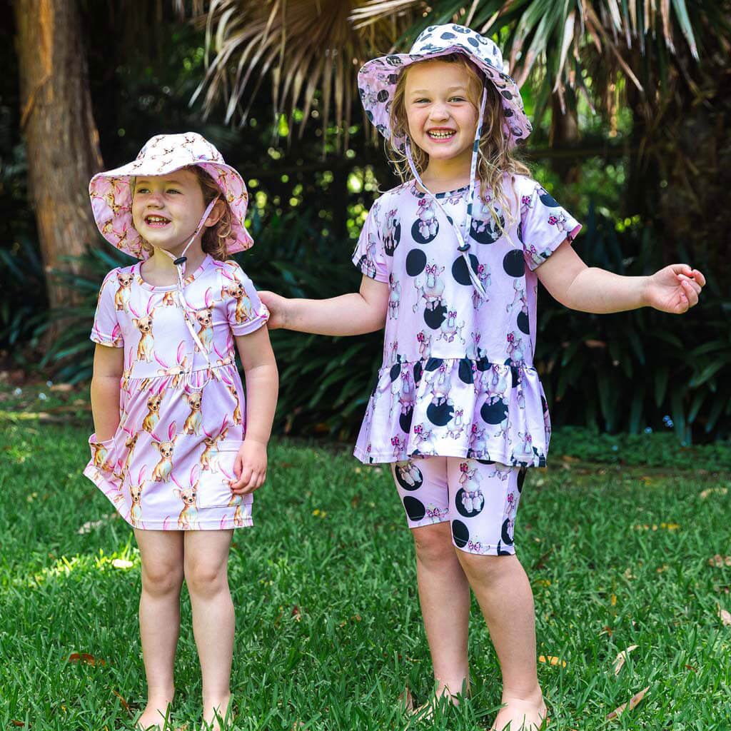 Girl Smiling Wearing Polkadot Poodle Beach Hat