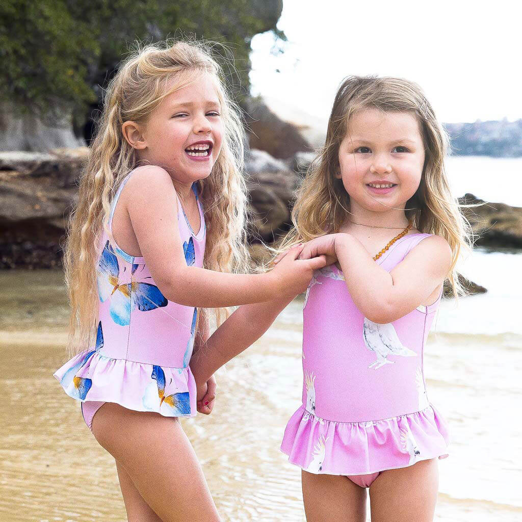 Girl At Beach Wearing Pink Cockatoo Tutu Swimmers